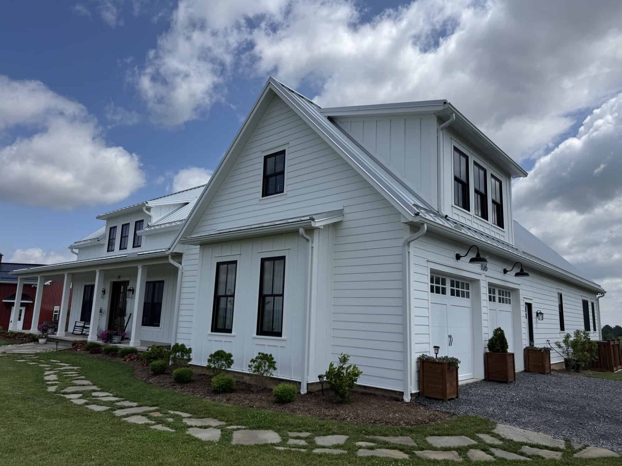Laser-straight exterior paint lines on State College home siding